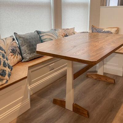 custom ash dining table to fit kitchen nook built-in