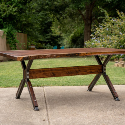 custom live edge walnut dining table with steam punk details