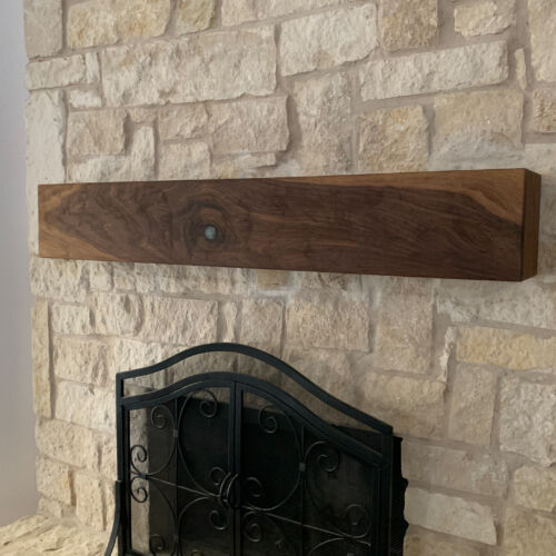 beautiful walnut fireplace mantel