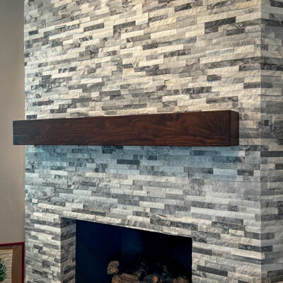 custom walnut fireplace mantel in heath texas home