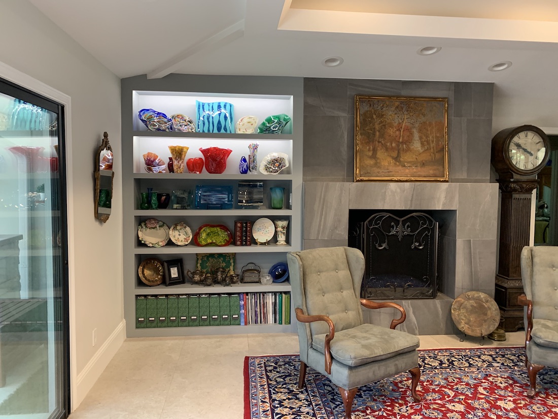 custom built-in that fits into a tight space next to the fireplace
