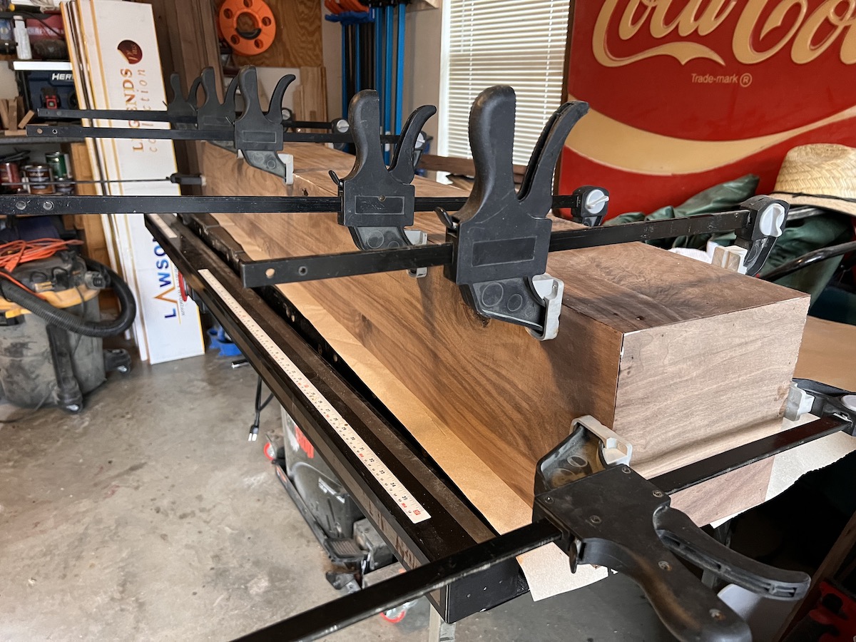construction of a custom fireplace mantel made out of walnut wood